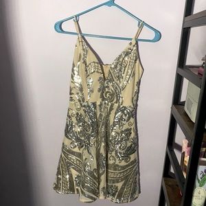 Light pink mini dress with silver sequin detailing